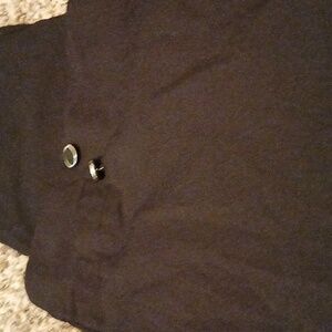Black slacks with button trim